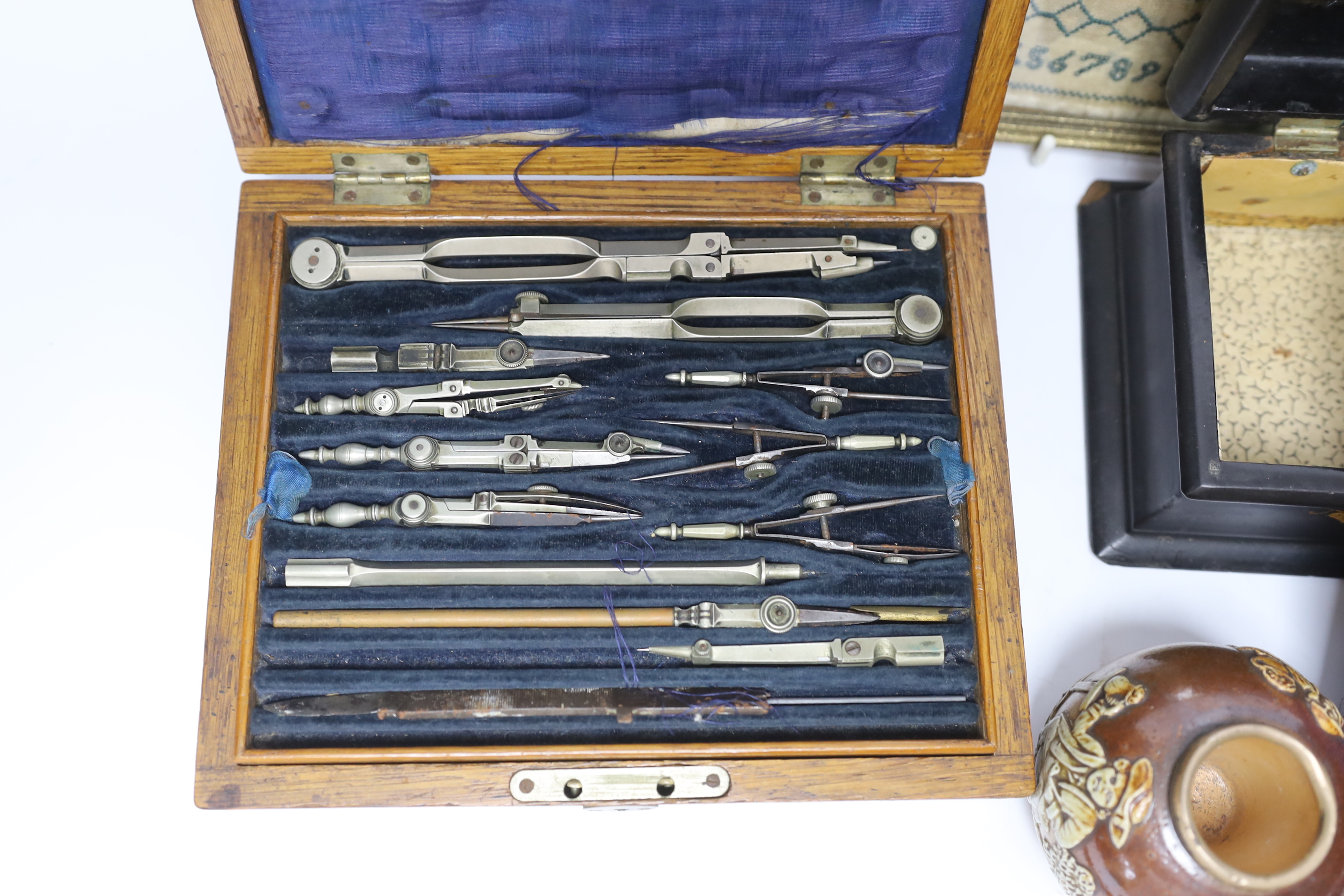 Sundry items and collectables including telescope, drawing sets, an alphabet sampler and an inlaid lacquered box, largest 51cm in length
